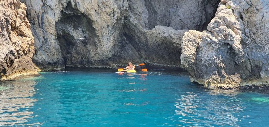 Taormina: Kayak Coastal Tour to Isola Bella and Blue Grotto - Paddling Across the Bay Toward Isola Bella