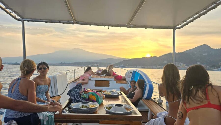Taormina: Sunset Boat Tour with Aperitif - Grotta della Conchiglia and the sunset near Villagonia