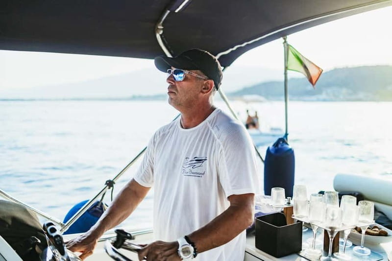 Taormina: Sunset Boat Tour with Dolphin Watching & Aperitif - Swimming and snorkeling in Taormina Bay
