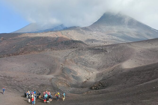 Tour to the Summit Craters of Etna 2920 meters with cable car and Jeep - Inside an Etna lava cave