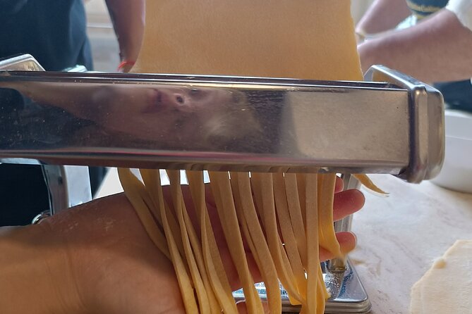 Traditional Sicilian Recipes in Palermo - Making fresh fettuccine with tomato and basil